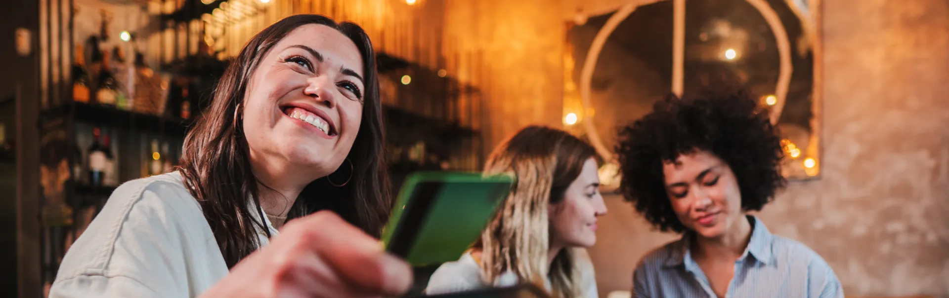 A customer is making a payment in a cafe IFB (3)