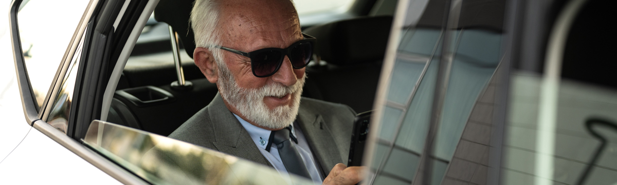 Senior businessman using smartphone ifb